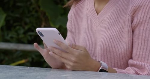 Woman Using Phone Outdoors