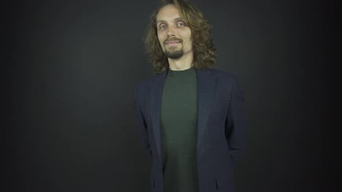 Man Smiling with Blazer in Studio