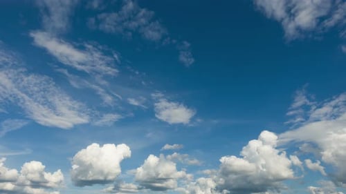 Clouds Drifting in a Vibrant Blue Sky