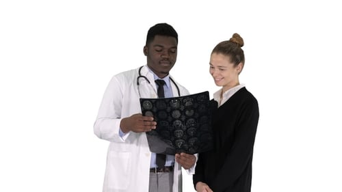 Doctor Explains X-Ray to Female Patient