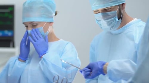 Medical Team Performs Surgery in Operating Room