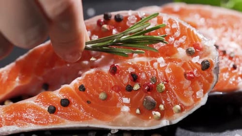Fresh Salmon Steak Garnished with Rosemary