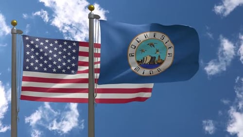 American and Rochester Minnesota Flags Waving in Blue Sky