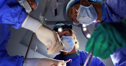 Surgeons performing operation 4k