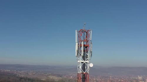 High telecommunication tower and blue sky 4K drone footage