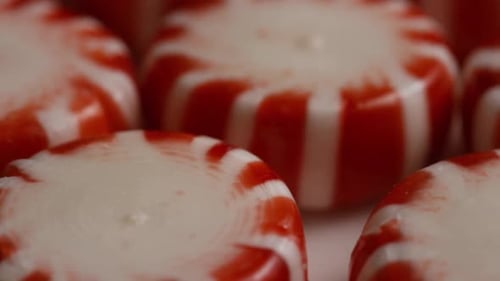 Rotating shot of peppermint candies - CANDY PEPPERMINT 038