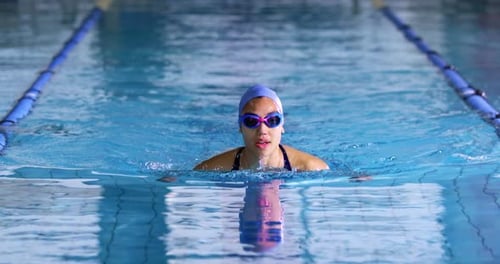 Swimmer training in a swimming pool