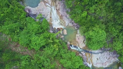 Flycam Rotates Over Wonderful River with Cascades