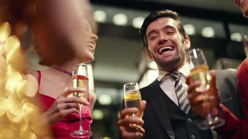 4K Group of people celebrating holiday event with toasting champagne glasses together at luxury bar