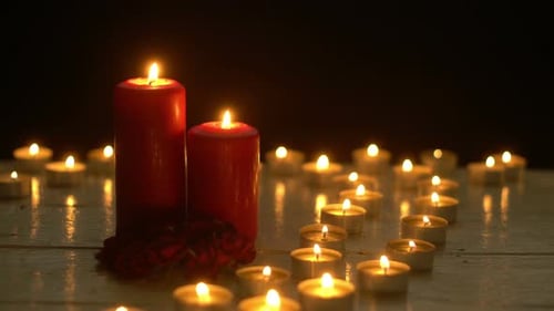Burning Candles and Flowers for Celebrations