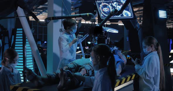 Young Scientists are Researching an Alien in a Laboratory, Science ...