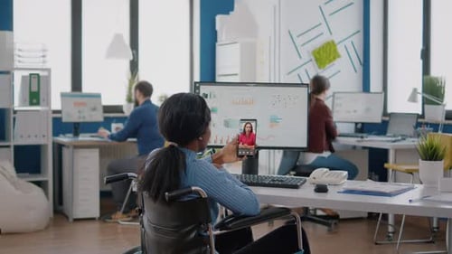 Office Worker in Wheelchair on Video Call