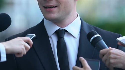 Professional Being Interviewed by Press