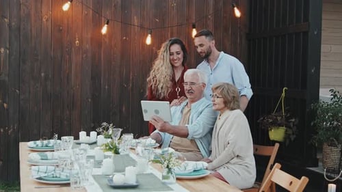 Family Video Call at Outdoor Birthday Celebration