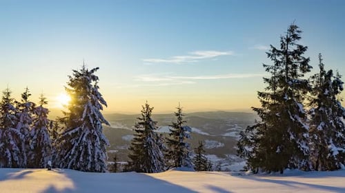 Sundown Time Lapse in Winter Mountain