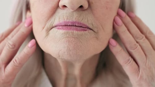 Close Up of Mature Woman's Face and Hands