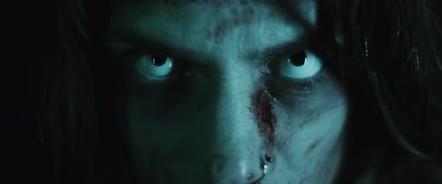 Scary Woman with Blood and Glowing Eyes