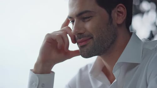 Businessman Working on Laptop in Office. Male Manager Looking on Laptop Screen
