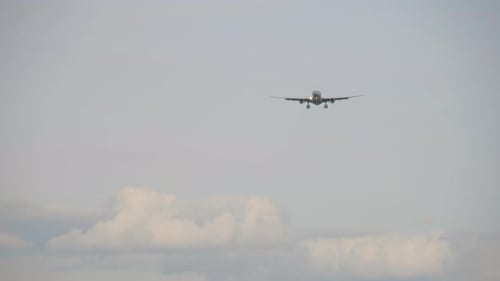 Jet Airplane Flies to Land