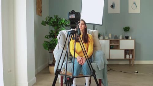 Woman Vlogging, Recording Video in a Home Studio
