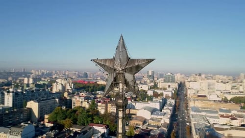 Aerial View of Cityscape and Towering Star Spire