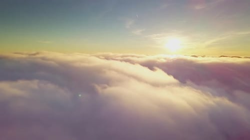 Aerial View of Clouds at Golden Hour