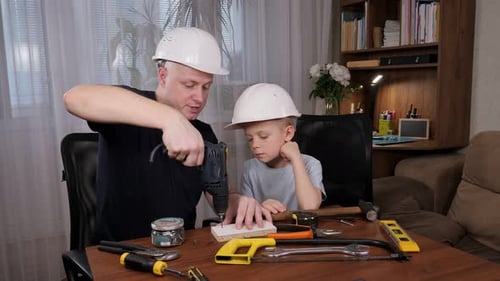 Father and Son Working with Tools at Home