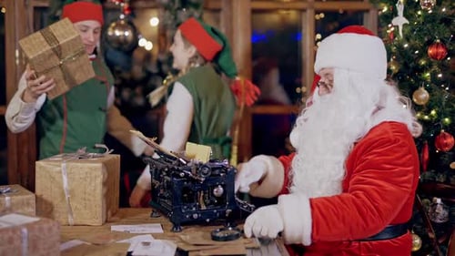 Santa and Elves Prepare for Christmas at Home