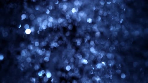 Blue bokeh texture Loop with defocused lights