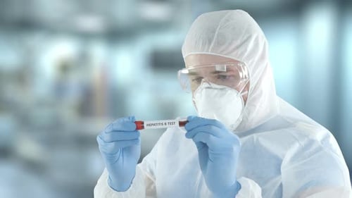 Medical Professional Holds Hepatitis B Test Tube