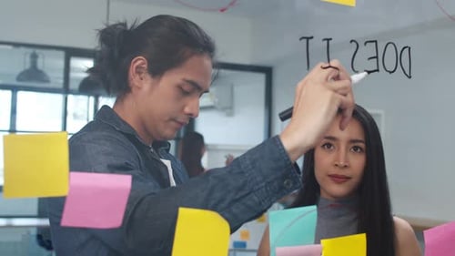 Creative Team Brainstorming Ideas at Office