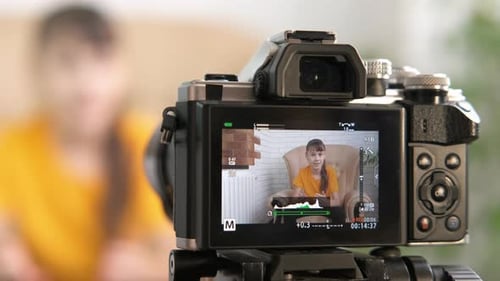 Digital Camera Records Young Girl Vlogging