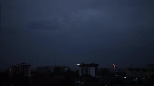 Lightning Bolts Flashes Composition with View of Night City Sky with Clouds