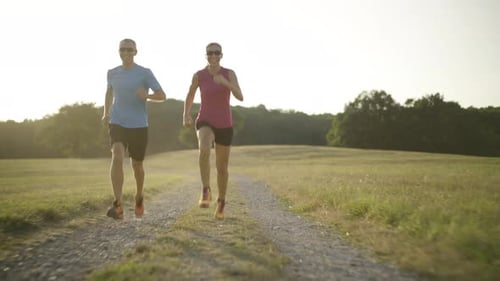 Couple Running Fast and Smiling
