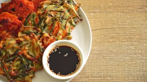 Korean Vegetable Pancakes with Dipping Sauce on Plate