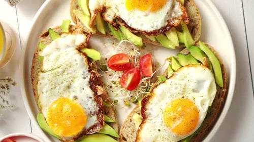 Avocado Toast with Fried Eggs Breakfast Close Up