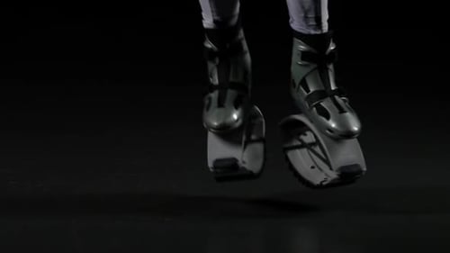 Close-up Legs Jumping in Gray Kangoo Jumps Shoes, Slow Motion