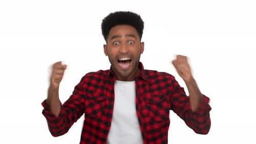 Portrait of Excited Mixedrace Man with Super Hairdo and Bristle Being Excited Expressing Delight