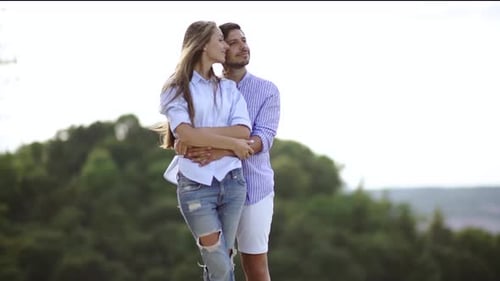 Beautiful Young Couple In Love Outdoors. Happy Young Man And Pretty Woman.
