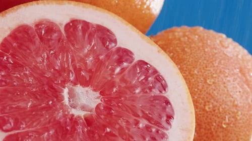Fresh Grapefruit Close Up with Water Droplets