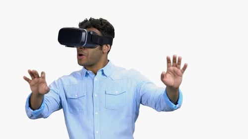 Man Using Virtual Reality Headset on White Background