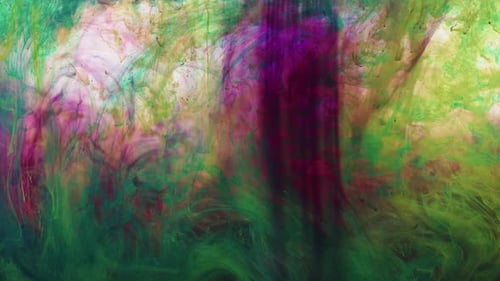Bunte Farbtinte tropft im Wasser 14