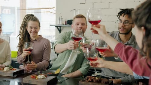 Friends Celebrate with Wine and a Feast
