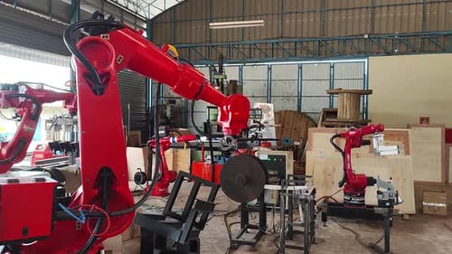 Robotic Arms Performing Automated Work in Factory