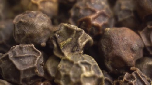 Close-up View of Pile of Black Peppercorns
