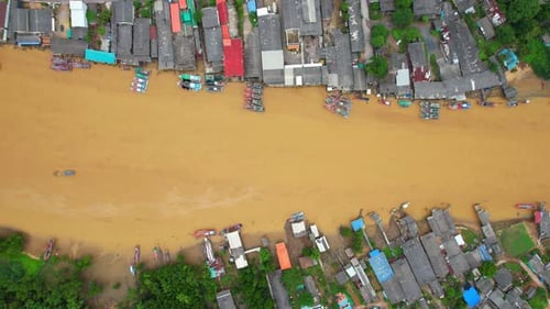 An aerial view over the river, fishing villages and fishing boats