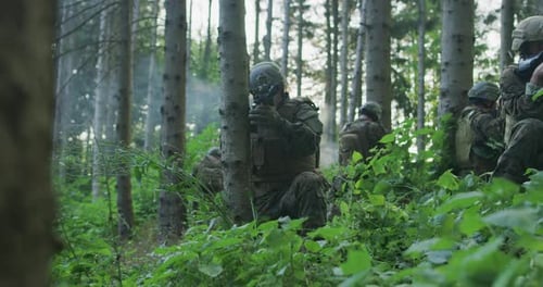 Soldiers with Rifles in Forest