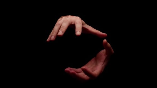 Hands Emerging from Darkness