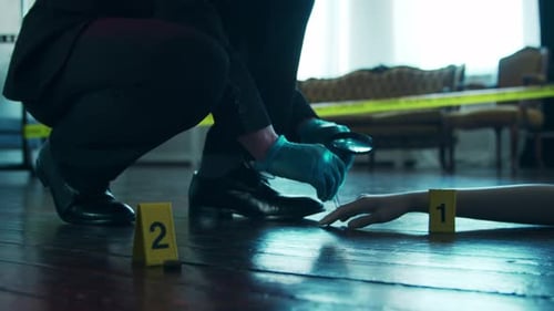 Detective Investigates Crime Scene Evidence with Magnifying Glass