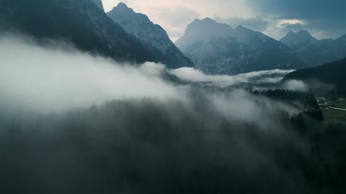 Scenic Mountain Valley Covered in Mist